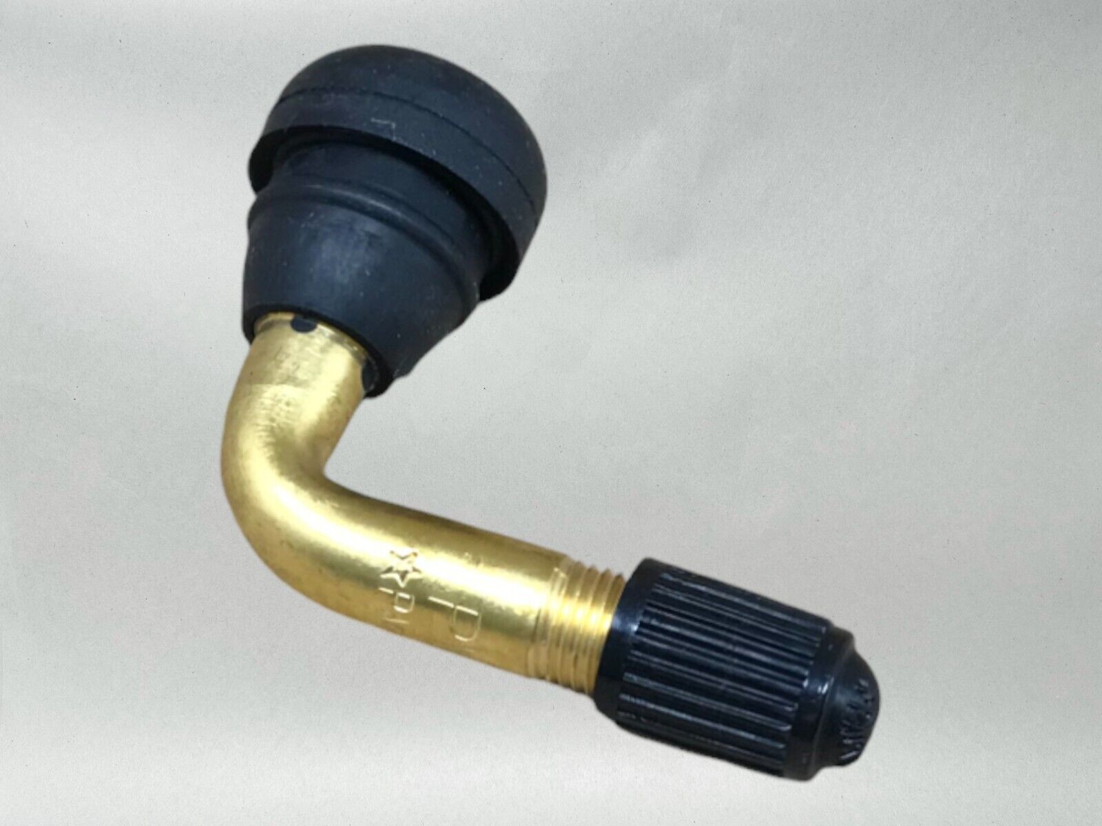 Honda OEM 90 DEGREE VALVE STEM RIM 42753-KJ9-003